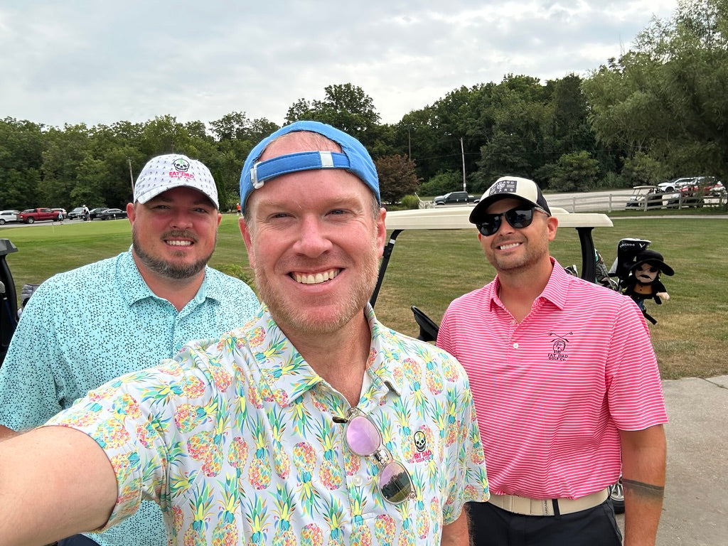 "the napkin" pink stripe clubhouse golf polo